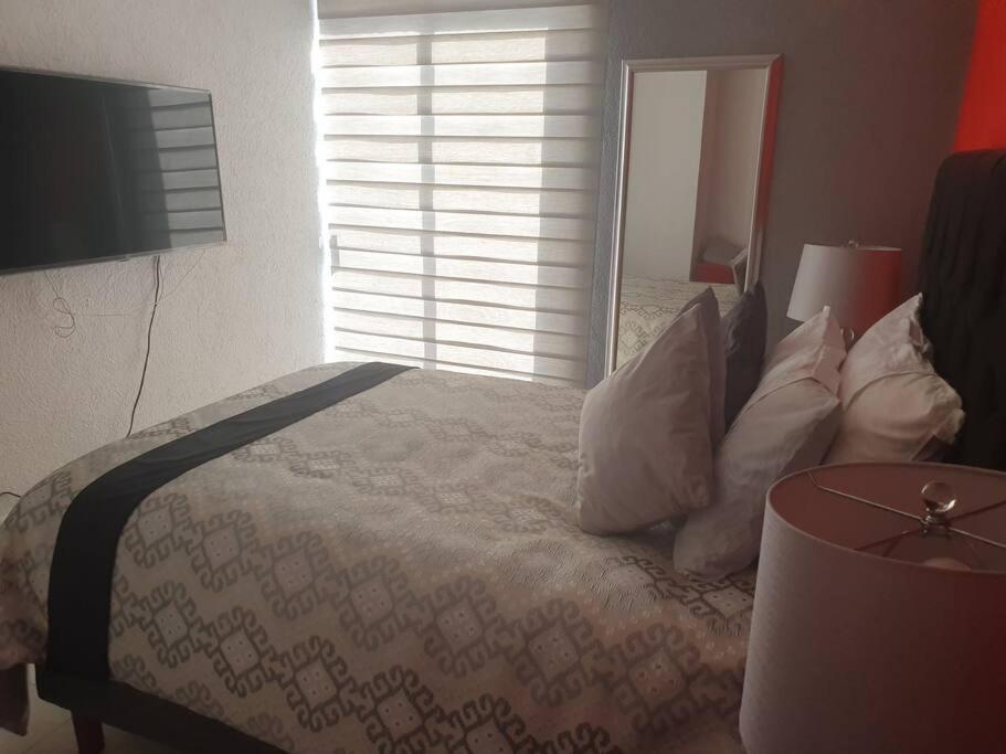 Ejecutivo Aeropuerto Apartment *