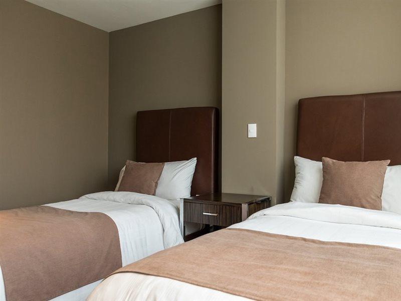 Apartahotel The Place Corporate